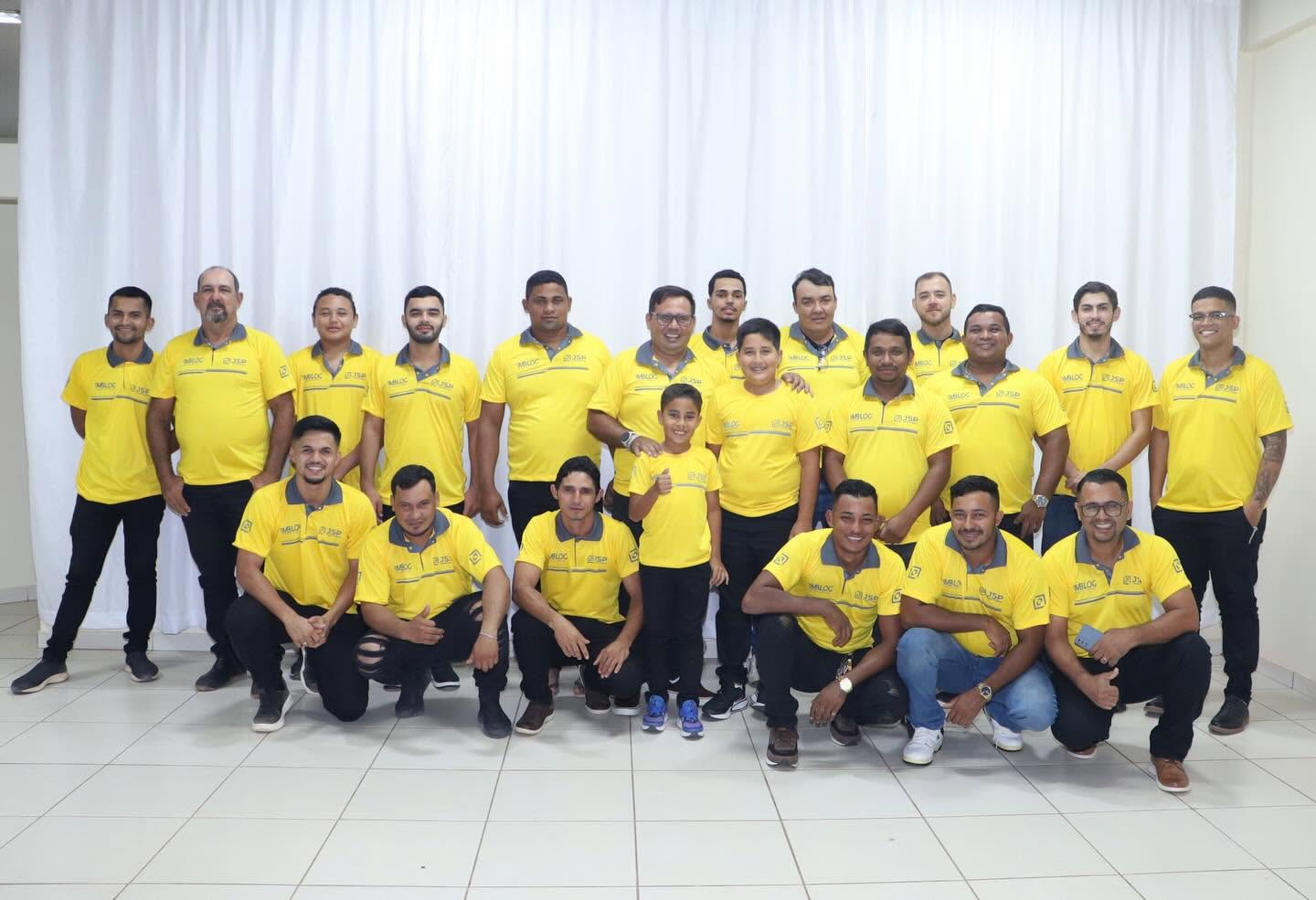 Equipe JSP Transporte & Logística uniformizada